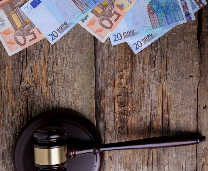 Judge hammer on the wooden table