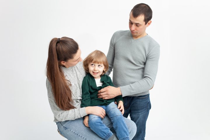 Problems in family, divorce, child is naughty, shkodly. family on white background isolated. Concept
